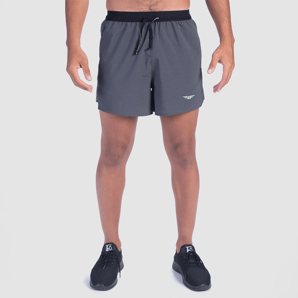 a fit man wearing short charcoal grey with shoes black  