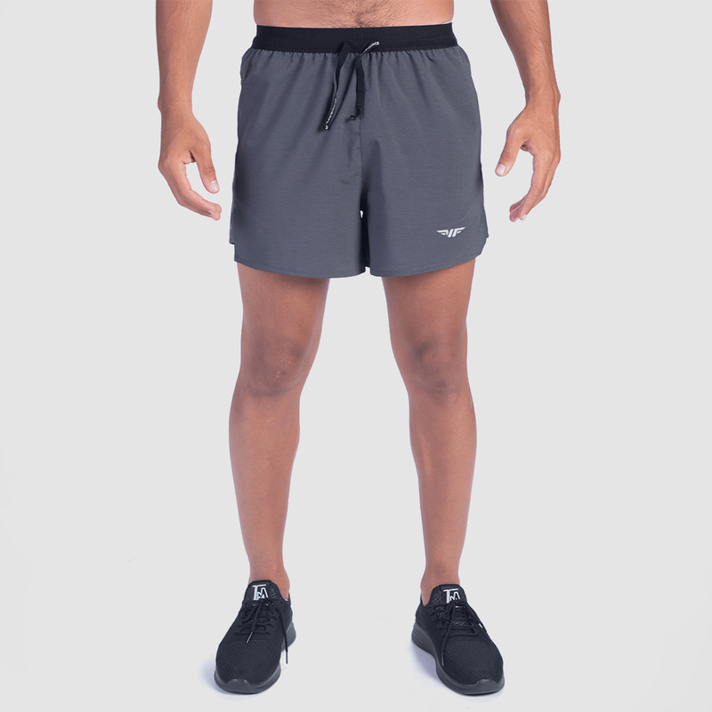 a fit man wearing short charcoal grey with shoes black  