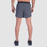 a back view for fit man wearing short  charcoal grey with shoes black  
