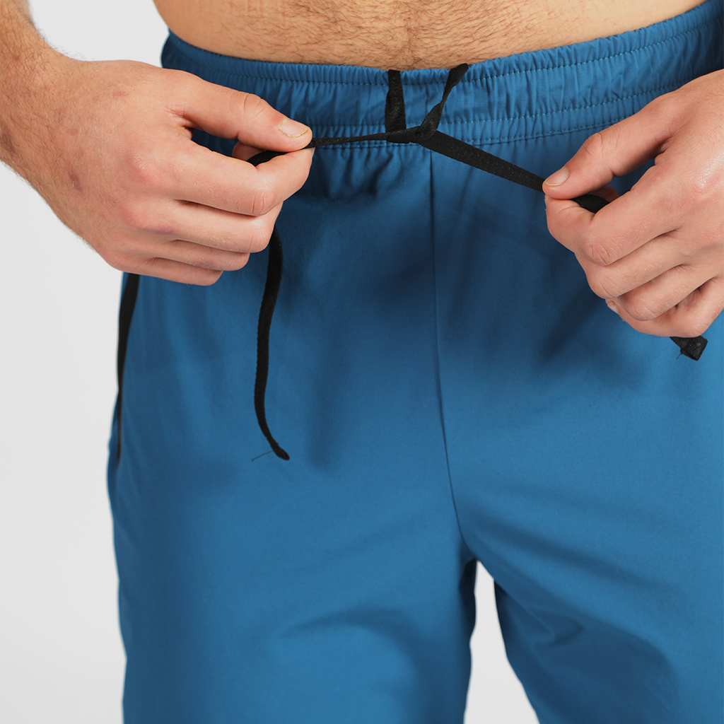 close up view for  fit man wearing pants classic blue 