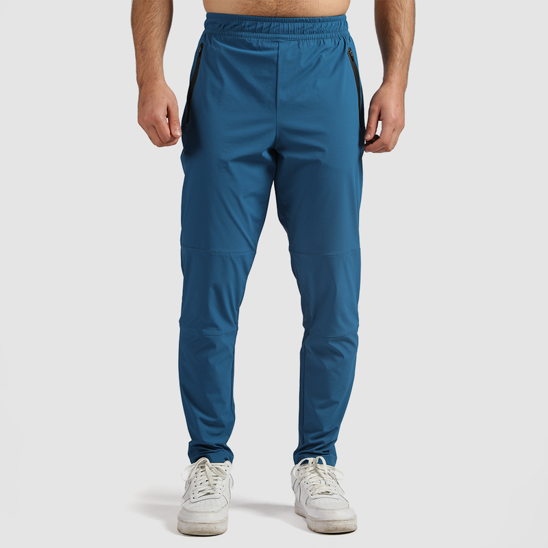 a fit man wearing pants classic blue with shoes  white 