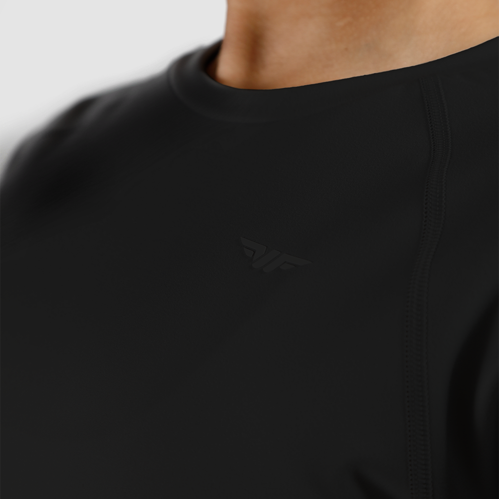 close -up view for fit woman wearing 
 crop top black with logo 