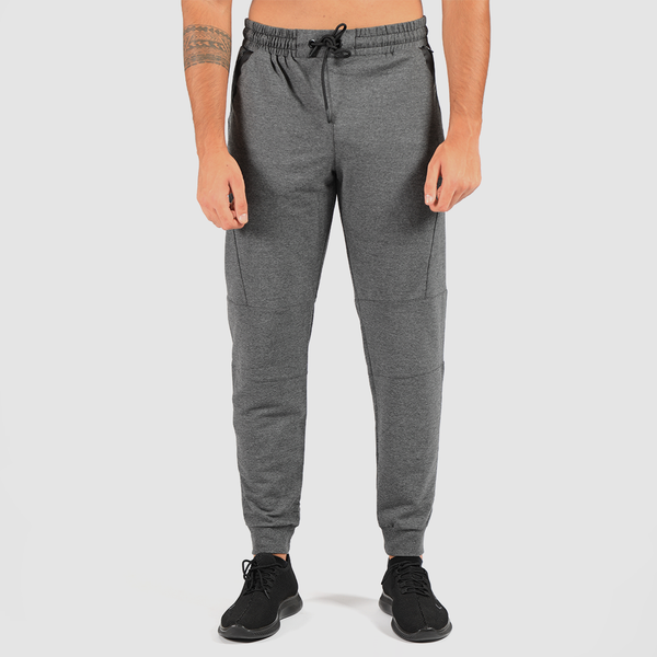 a fit man wearing pants marl light grey with shoes black 