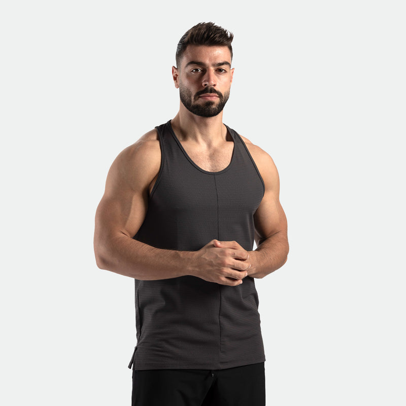 a fit man wearing t-shirt  dark grey with pants black 