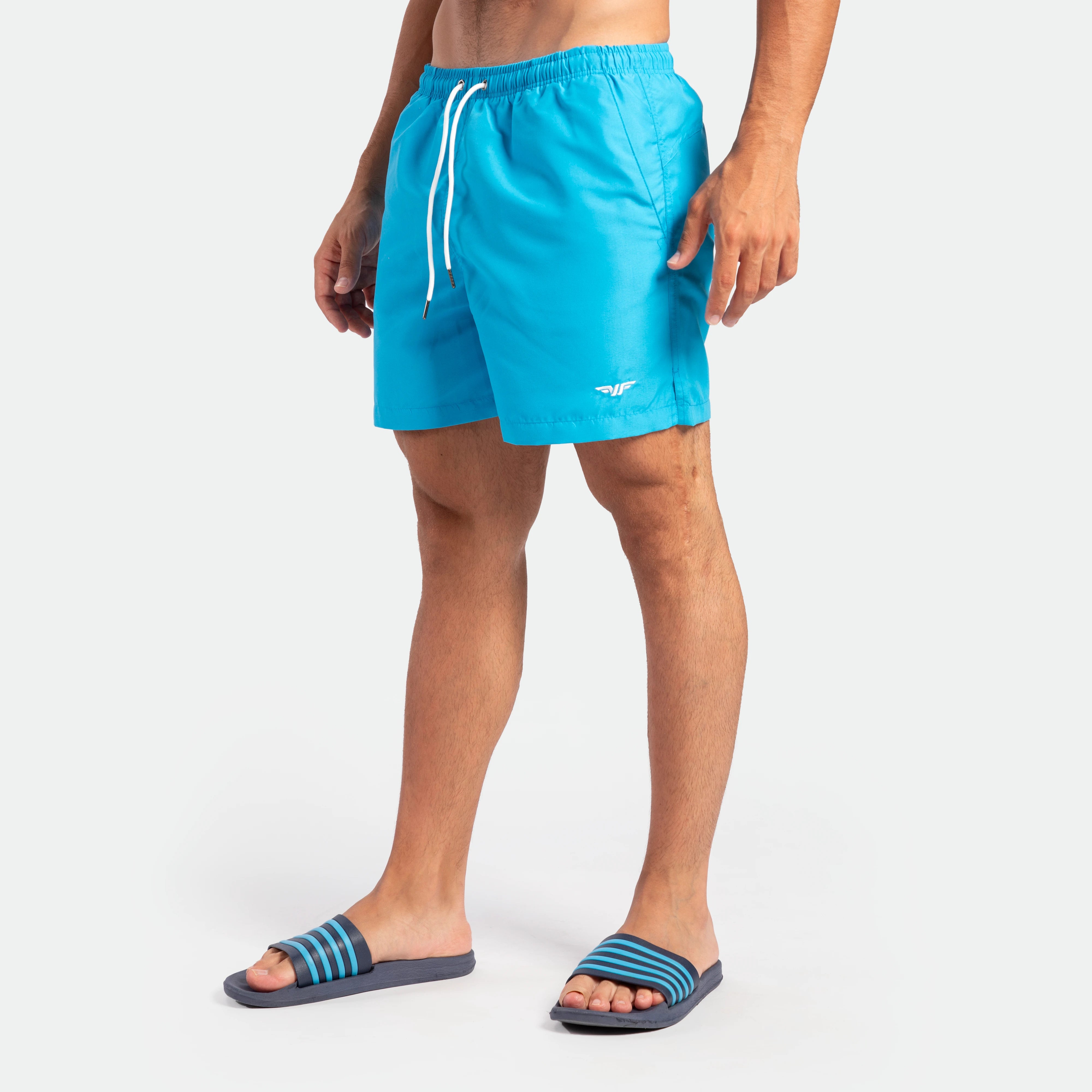 a fit man wearing short blue 