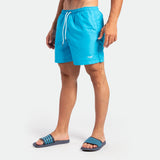 a fit man wearing short blue 