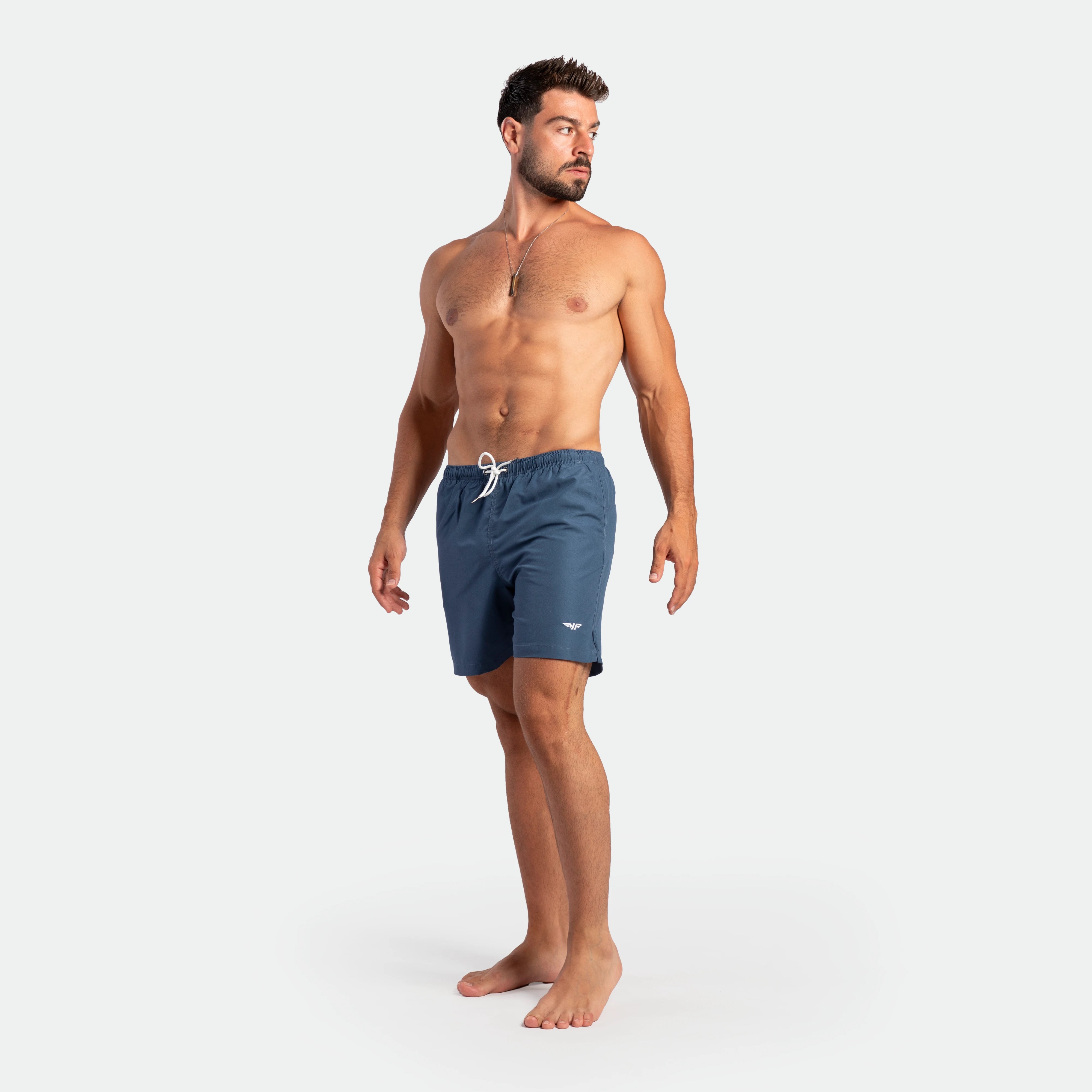 a fit man wearing short ensign blue 