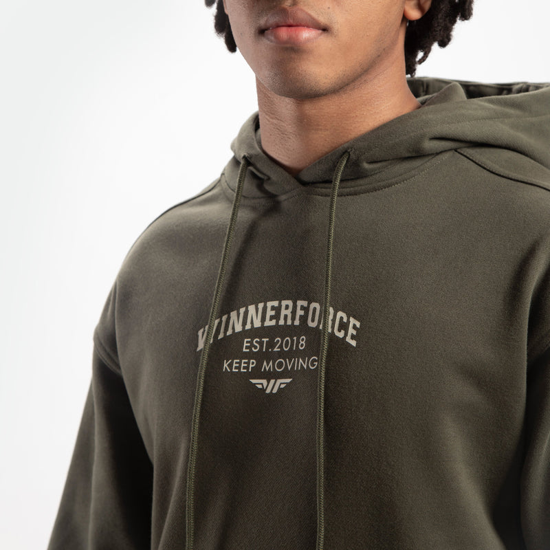 close up view for fit man wearing hoodie forest night green 