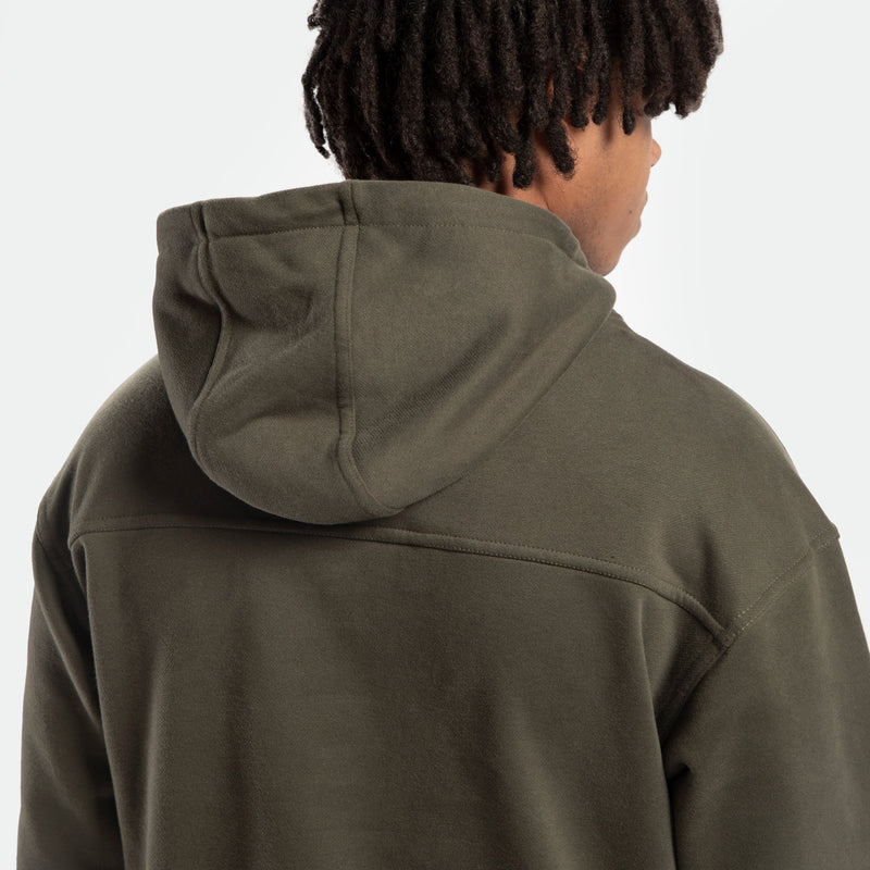 close up view for back view of man wearing hoodie forest night green 