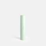 Tall, cylindrical, pastel green packaging tube with subtle embossed logo and text "Winnersforce" stands upright on a plain white background.