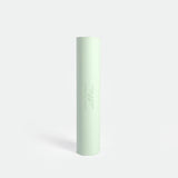 A light green cylindrical yoga mat stands vertically against a white background. The brand logo and name "Winnerforce" are subtly printed on the surface.