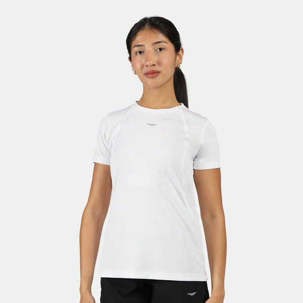 a fit woman  look at the camera and she wearing t-shirt white with logo, short black with logo ,plus the background is light grey 