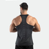 a back view for fit man wearing t-shirt  camo tank graphite grey with pants black 