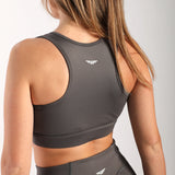 close up view for back view of woman wearing bra and legging quite shade grey 