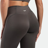 a back view for woman wearing legging grey 