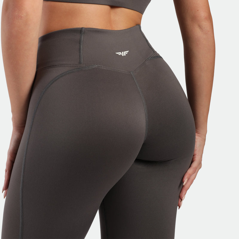 a back view for woman wearing legging grey 