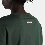 close up view  for man wearing t-shirt green with logo  