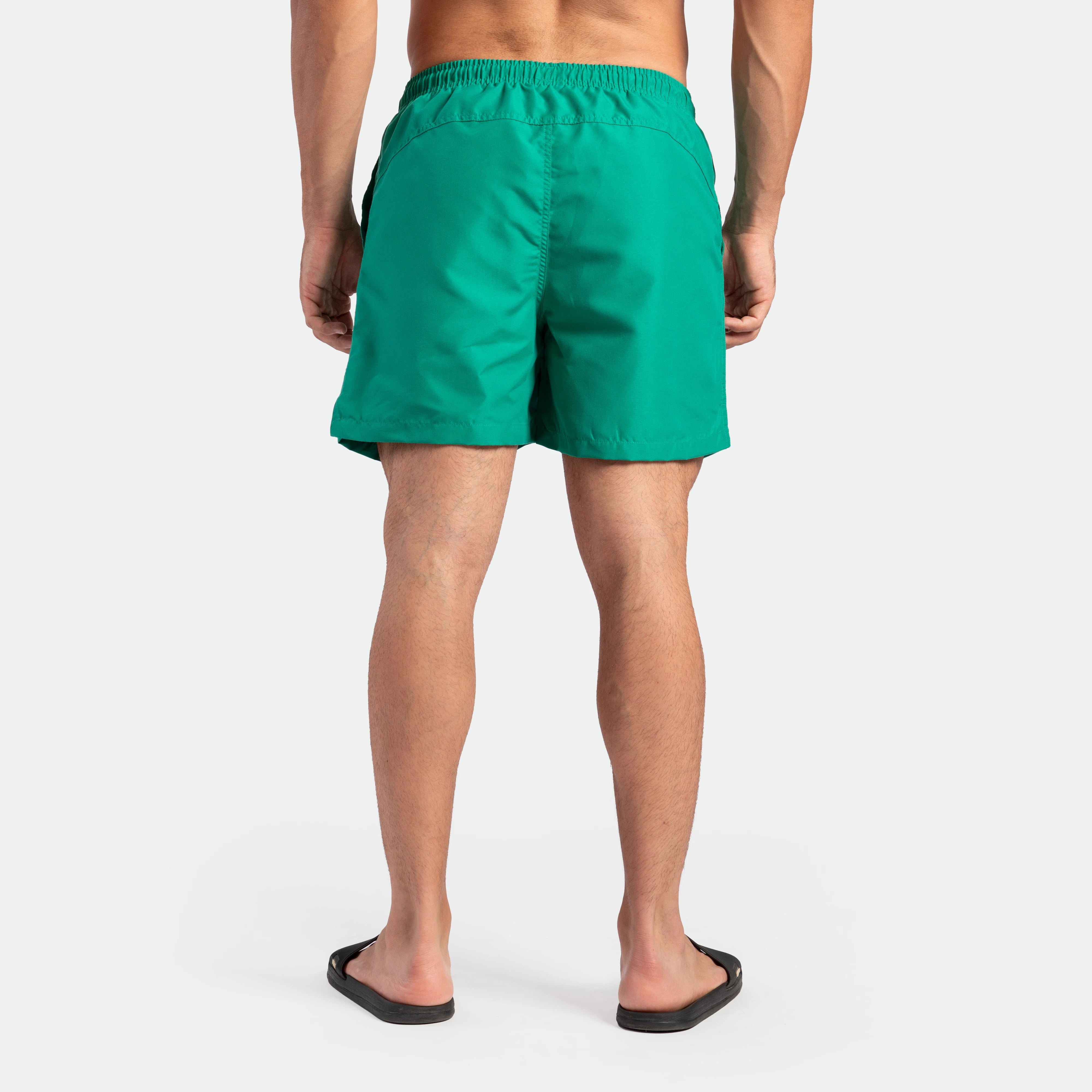 a back view for fit man wearing short green lake 