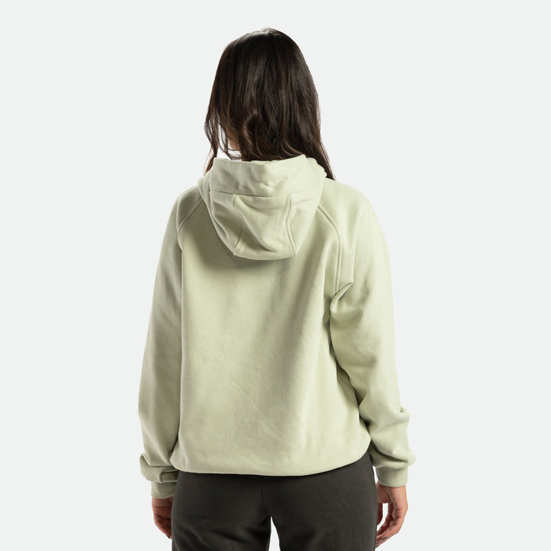 a back view for fit woman wearing hoodie green with pants 