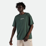 a fit man wearing t-shirt green with logo and he wearing pants beige with logo 