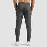 a back view for fit man wearing pants grey 