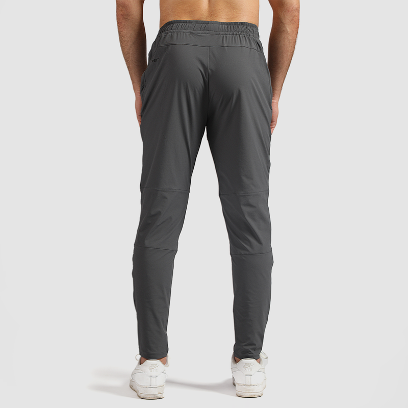 a back view for fit man wearing pants grey 