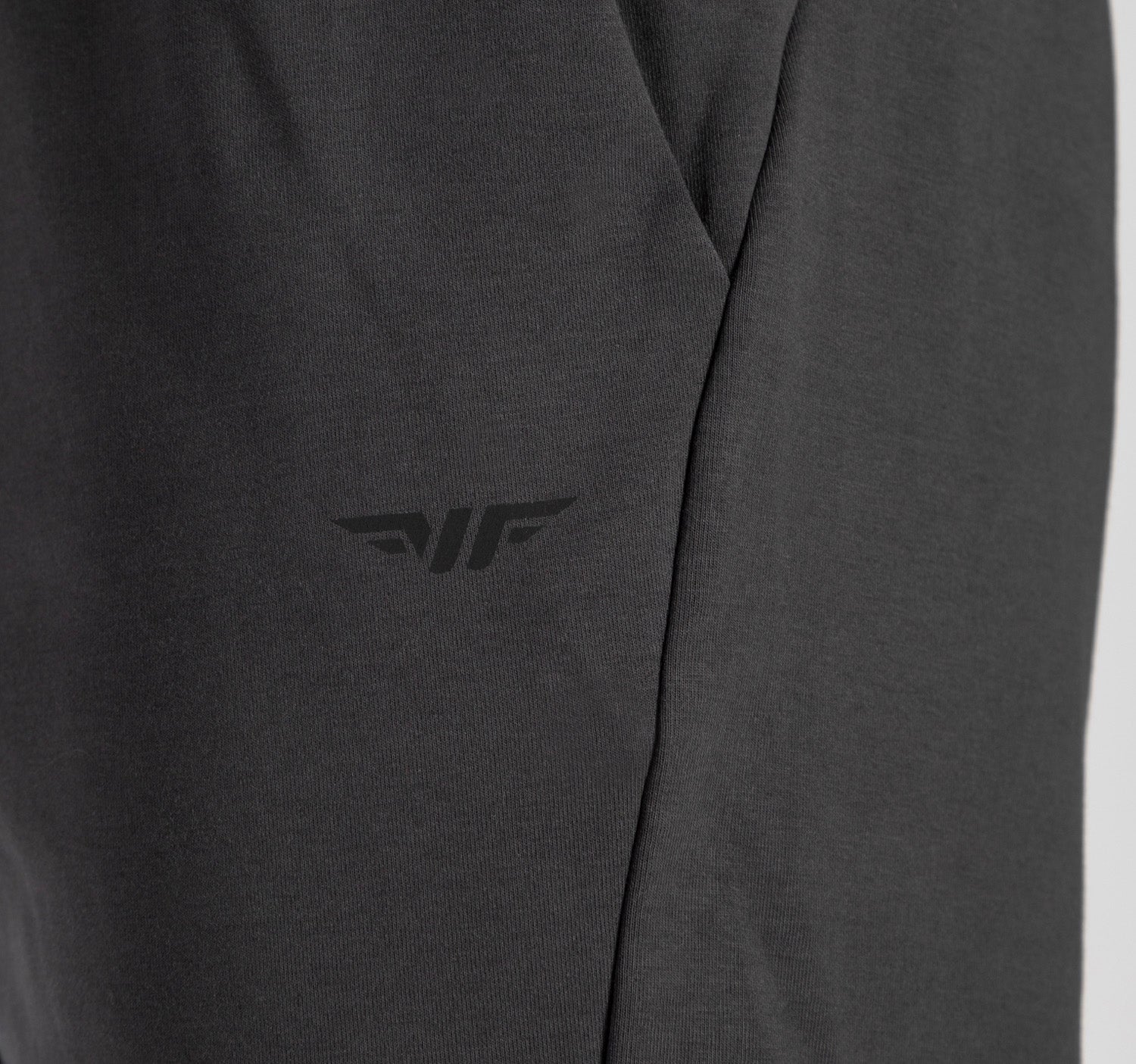 close up view for pocket of pants  with logo 