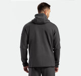 a back view for fit man wearing matching set  grey eboney ,tech zipped hoodie 