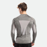 a back view for fit man wearing sleeve t-shirt  grey  with pants black 