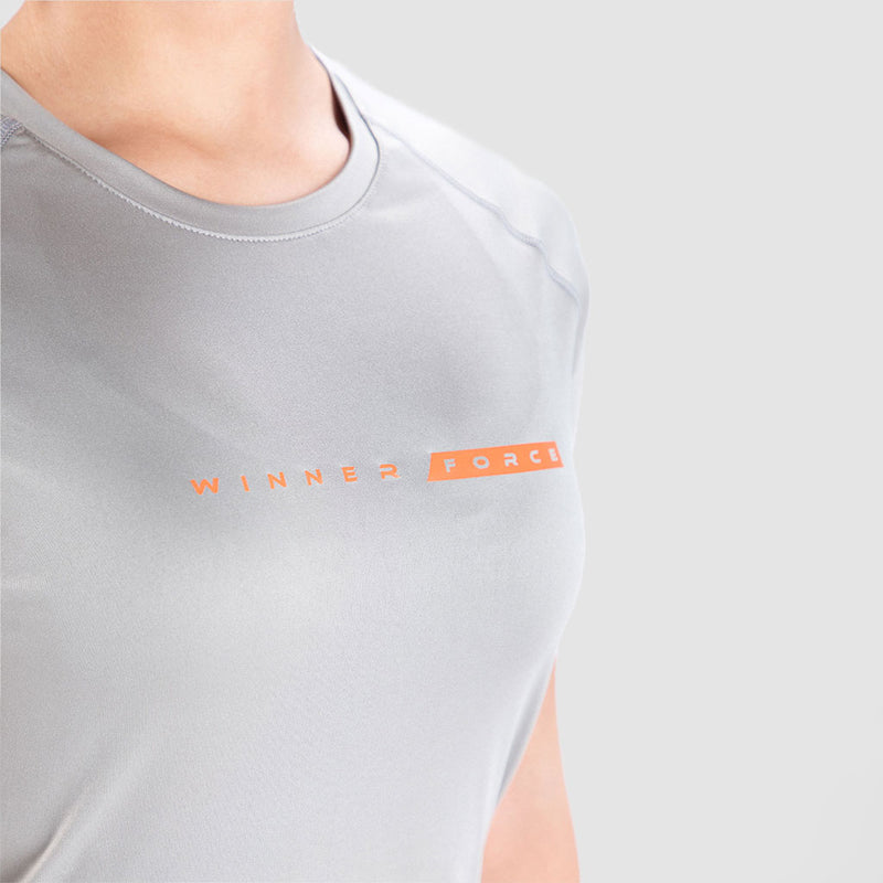 close up view for fit woman wearing t-shirt grey with logo orange 
