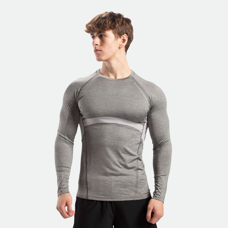 a fit man wearing sleeve t-shirt grey with pants black  