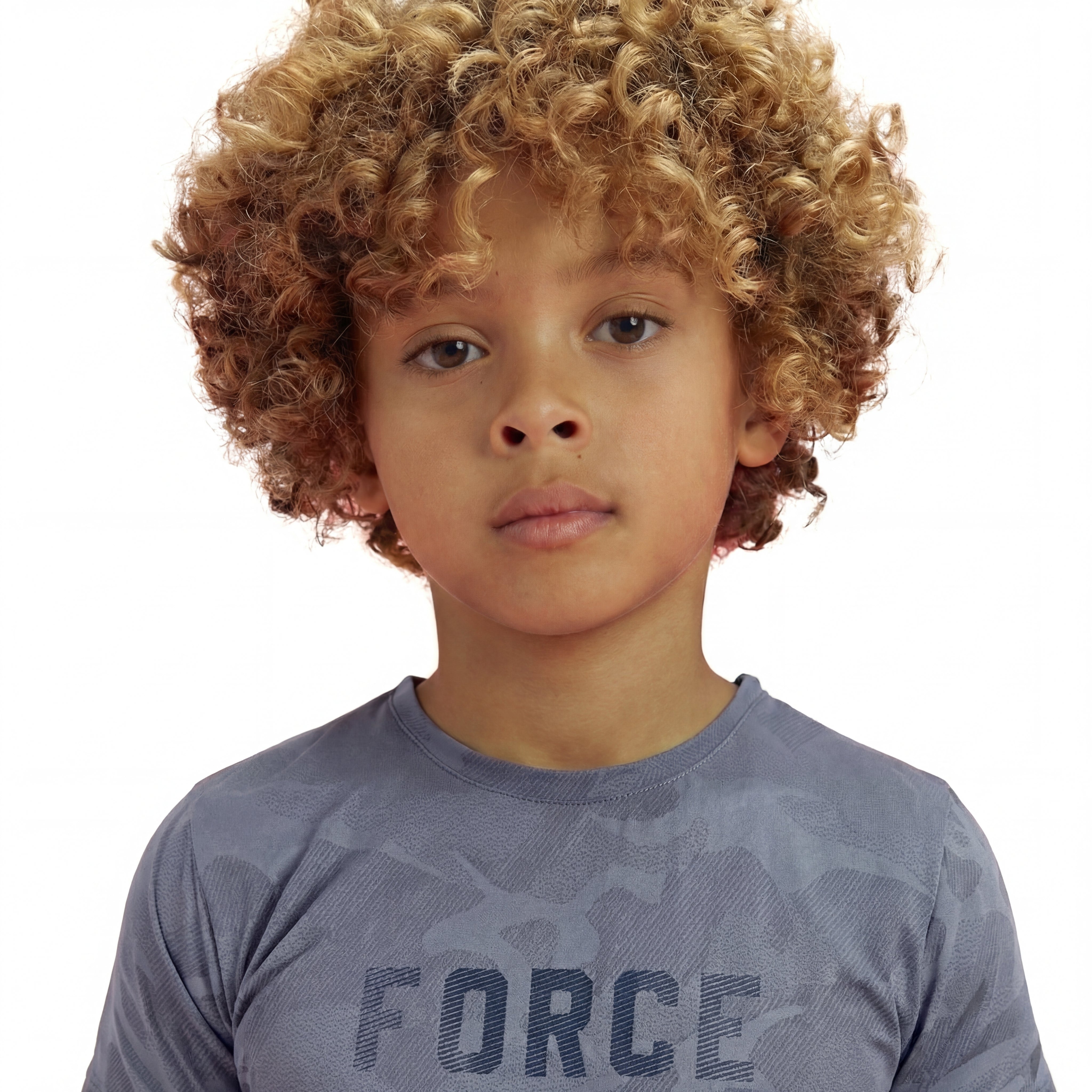 Close-up of a boy wearing a regular fit vintage indigo camo t-shirt with the word FORCE in big on it.
