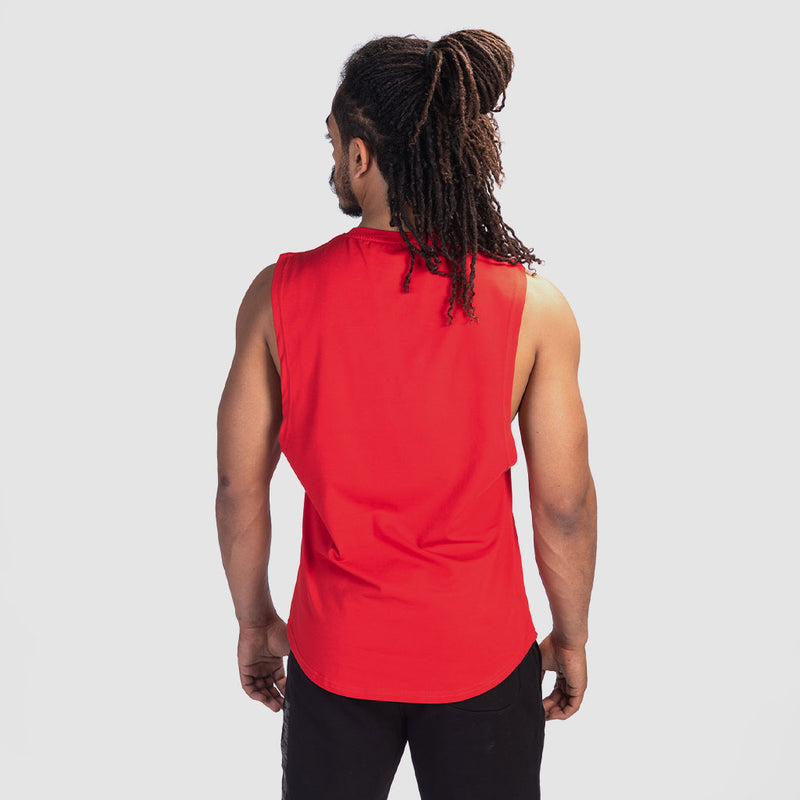 a back view for man wearing tank high risk red with pants black 