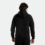 a fit man wearing  matching set black hoodie and pants 