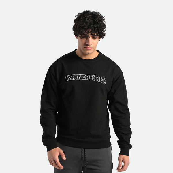 a fit man wearing hoodie black with pants grey 