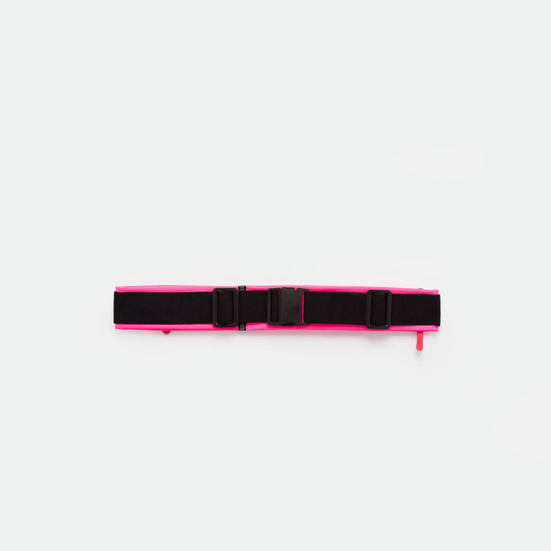 A hot  pink  utility belt with an adjustable buckle and two side straps, displayed on a plain white background.