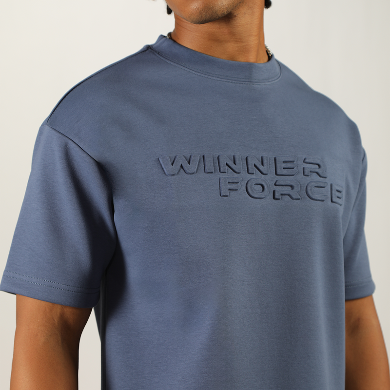 close up view for fit man wearing t-shirt indigo blue with logo 