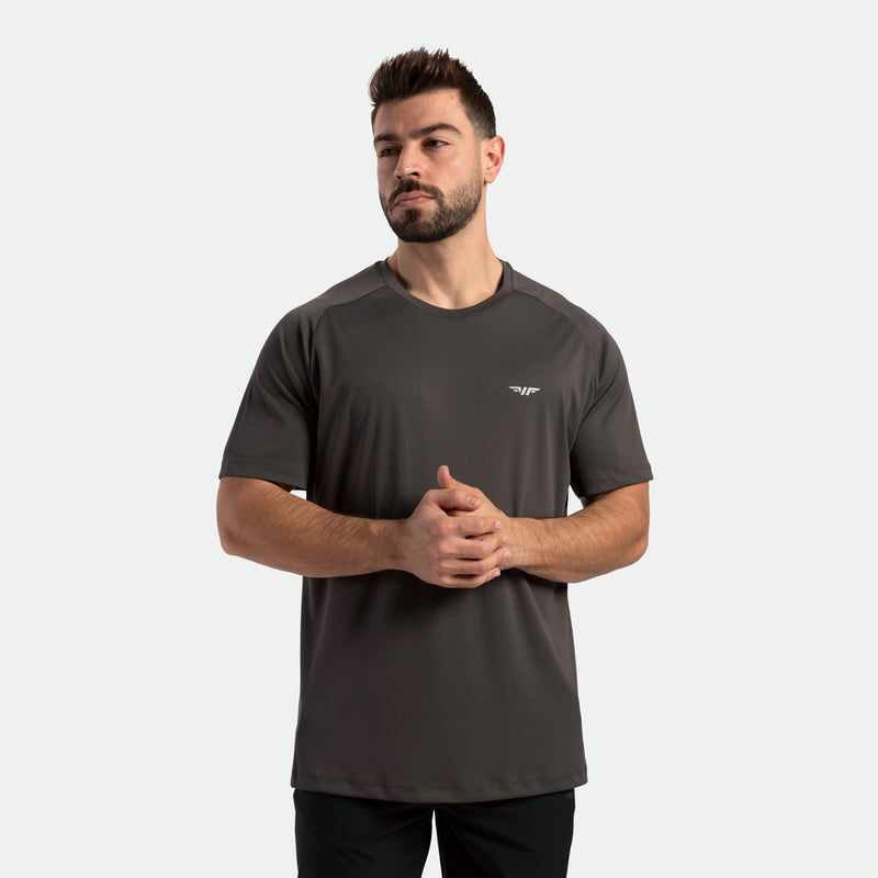 a fit man wearing t-shirt dark grey with pants black 