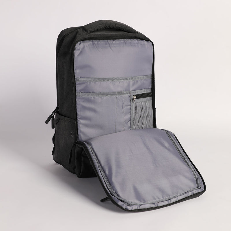close up view for backpack iron grey  open  with many zipper and pocket 