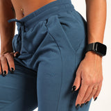 close up view for woman wearing jogger pants blue 