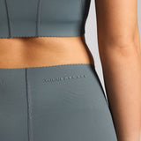 Gray athletic outfit with 'Winnerforce' branding on a neutral background