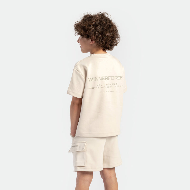 a back view for boy wearing matching set light beige ,t-shirt with logo and short with pocket 