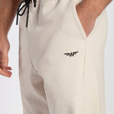 close up view for pocket of pants beige with logo black 