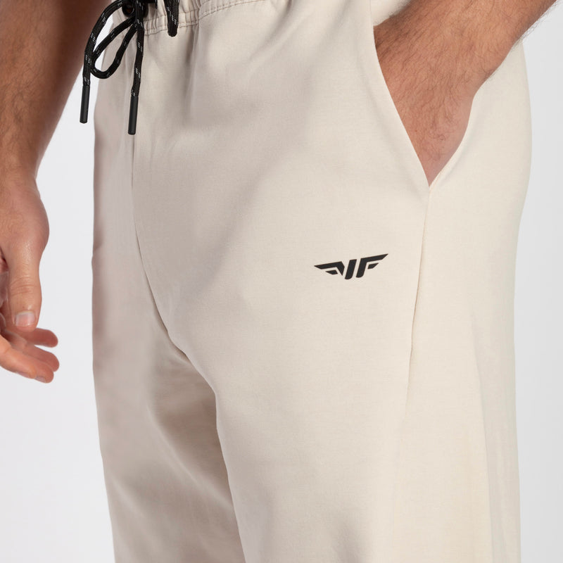 close up view for pocket of pants beige with logo black 