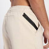 close up view for back view of pants light beige with zipper 