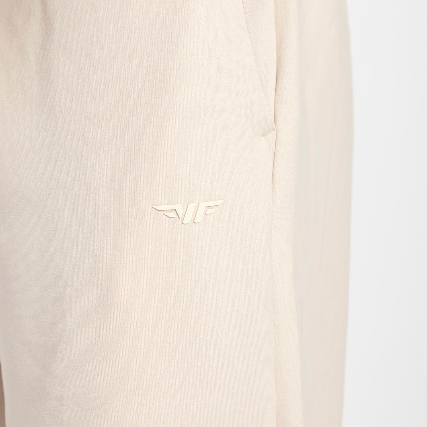 close up view for pocket of  pants  with logo