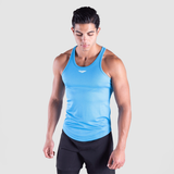 A man wearing a light blue sleeveless tank top with a racerback design, paired with black shorts. There is a small logo on the upper left part of the tank top.