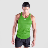 a fit man wearing tank online lime green with short  black 
