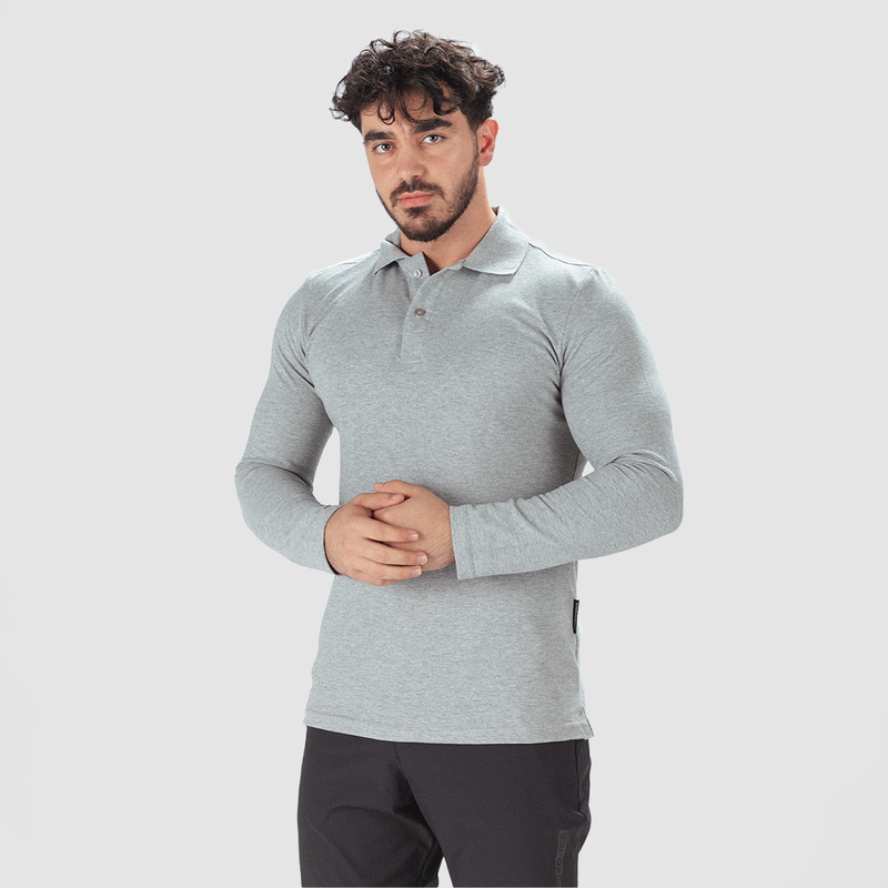 a fit man stand at right and wearing sleeve t-shirt grey with pants black 