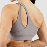 a back view for woman  wearing bra grey with specials design